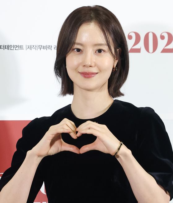 Actor Moon Chae-won makes a heart sign with her hands during a press event for the movie ″Heartman: Rock and Love″ (2026) in Songpa District, southern Seoul, on Jan. 8. [NEWS1] 
